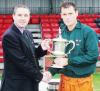 Ian Pomeroy Corps player of the year 2002 (left) for the second year running receives the trophy from UKLFcsg player Martin Carlon by Fozzy